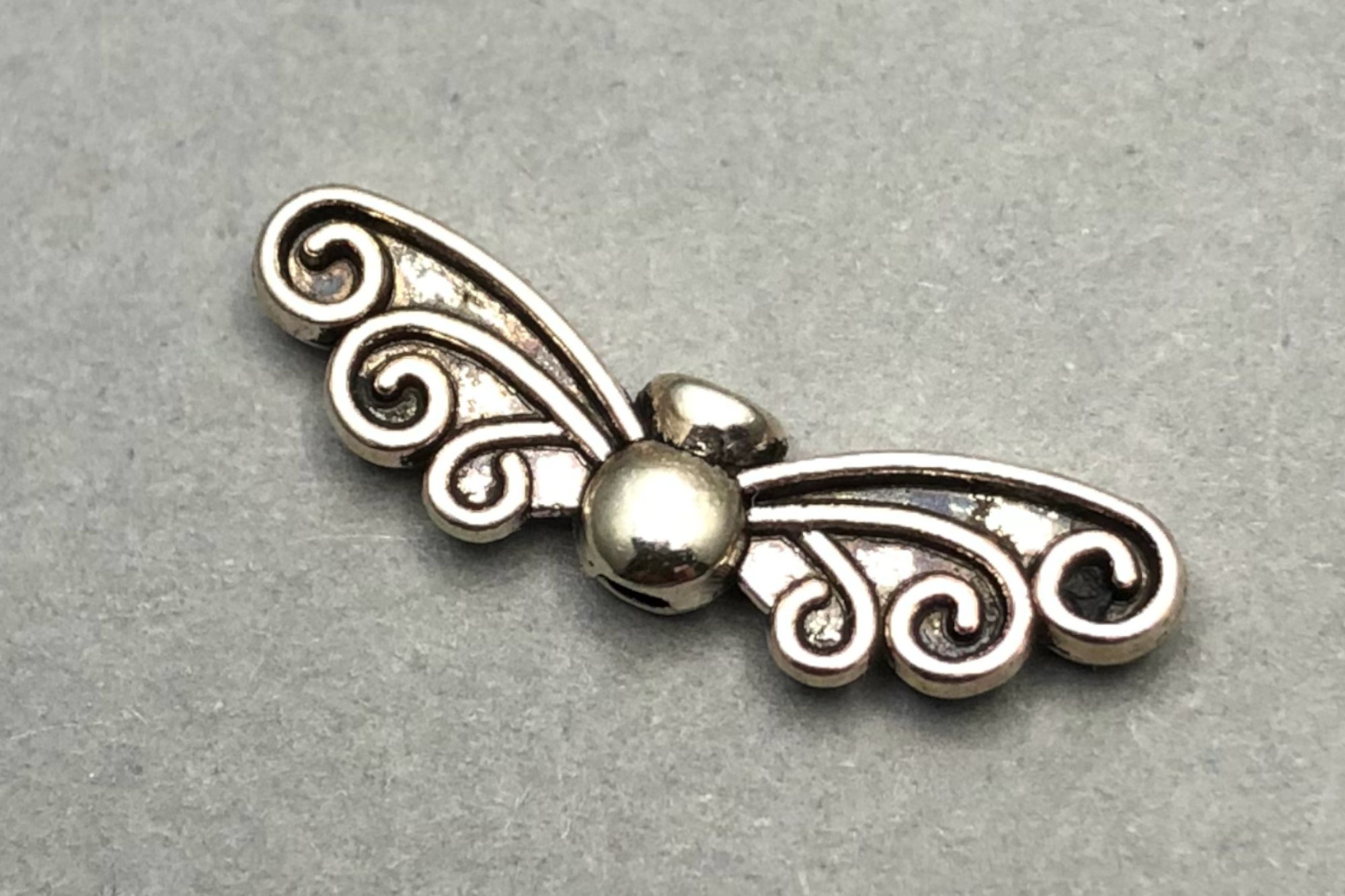 Antique Silver Plated Wings 22x6x3mm, 1mm hole